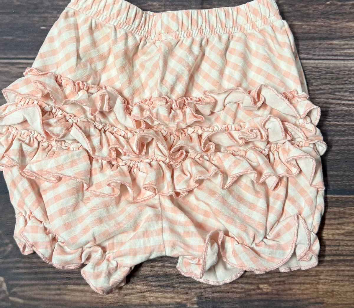 Serendipity 12-18m..front is plain without ruffles!