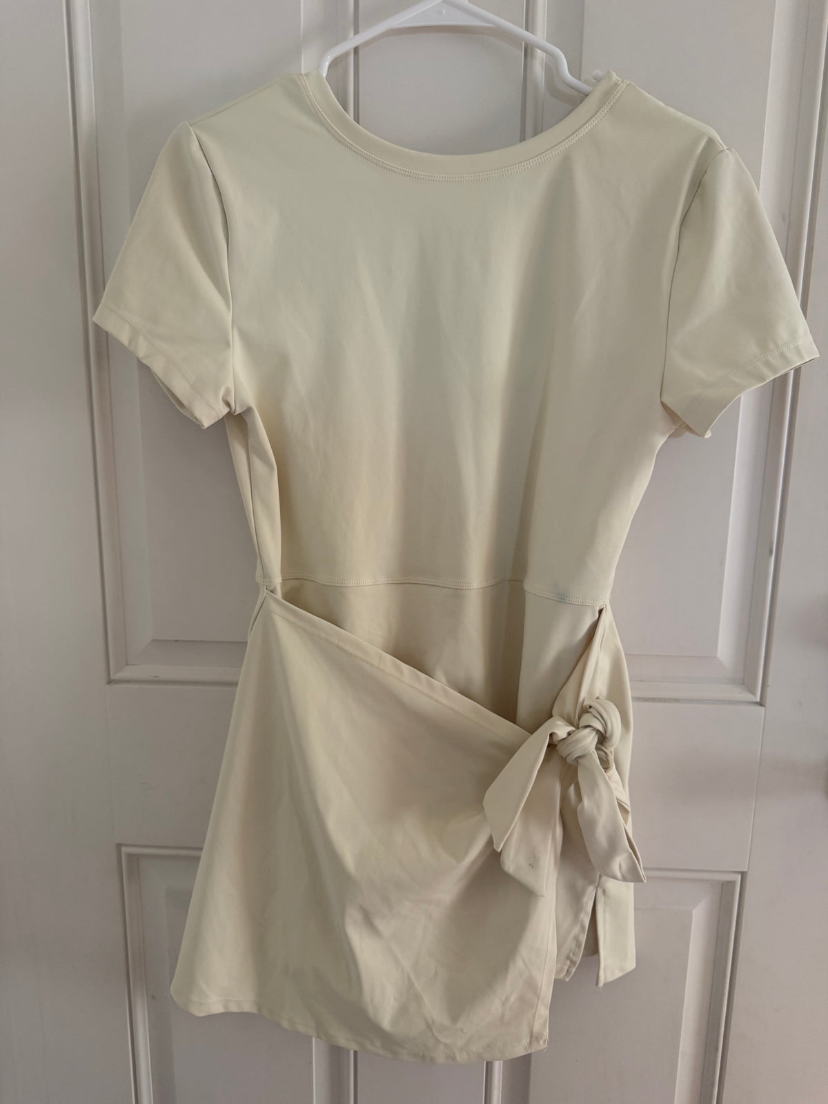 XL..romper with skirt tie! Color is butter yellow!